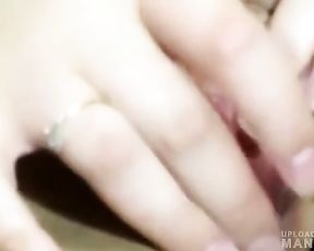 Plump slut fingering her shaved pussy
