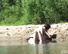 Pervert watching young couple fucking on the beach